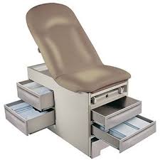 Tan medical examination table with storage drawers